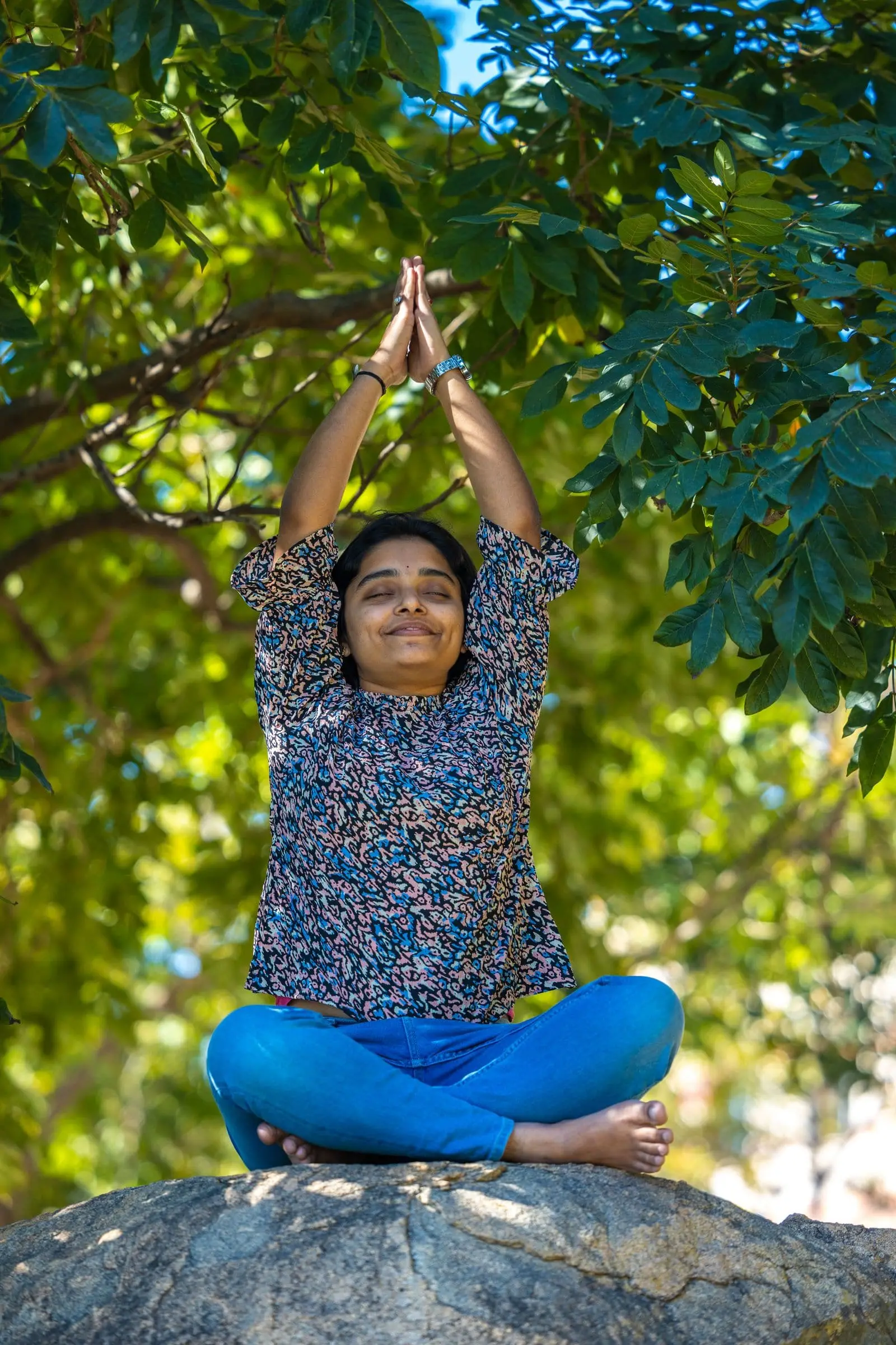 Women practising yoga together