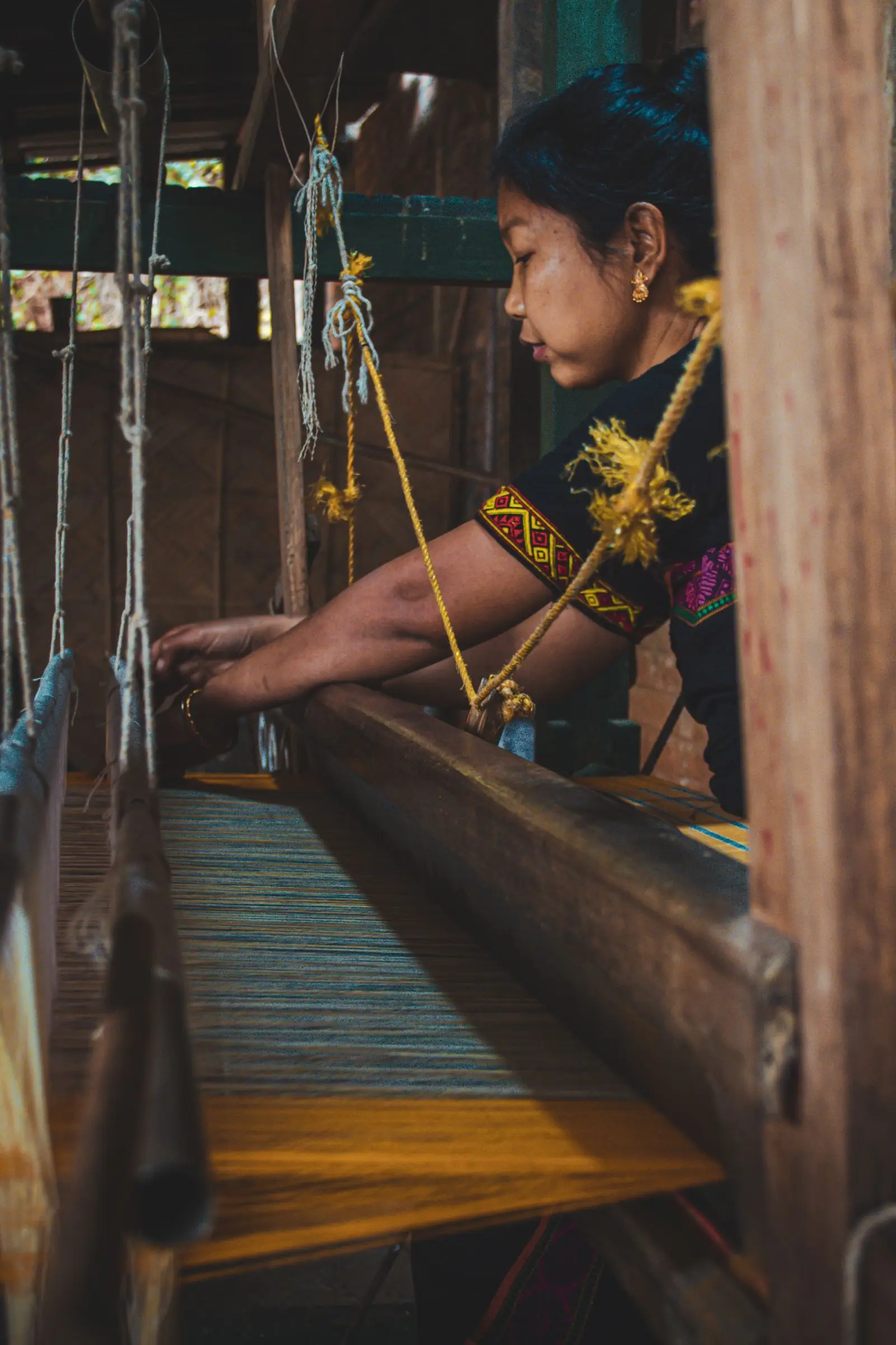 A woman at work on a sewing machine