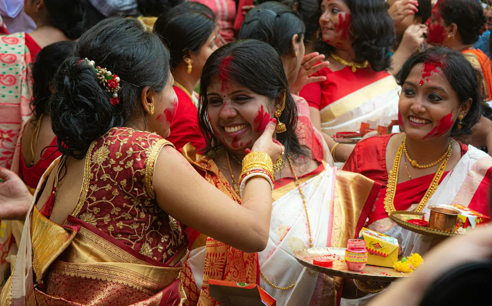 A group of women together, smiling
